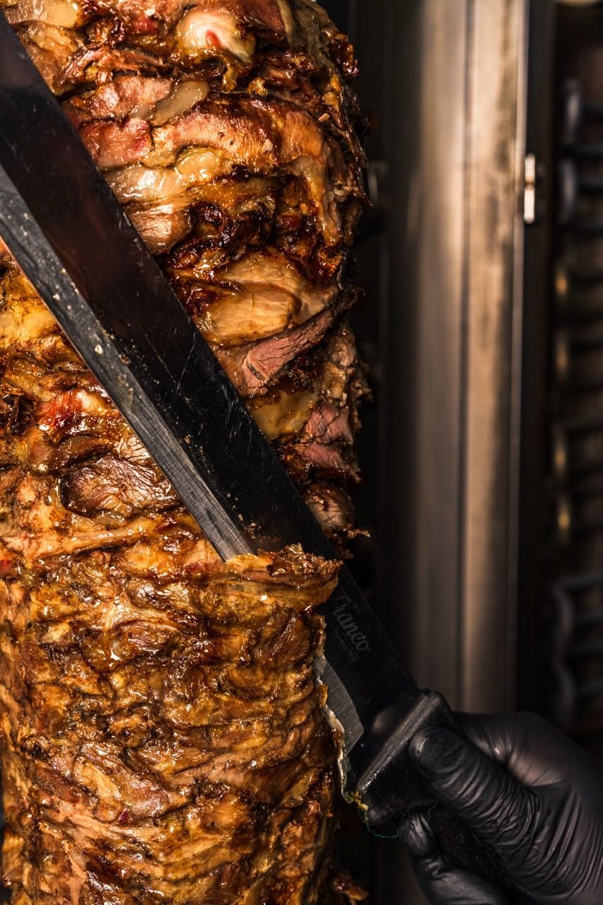 Lamb doner being carved from the spit