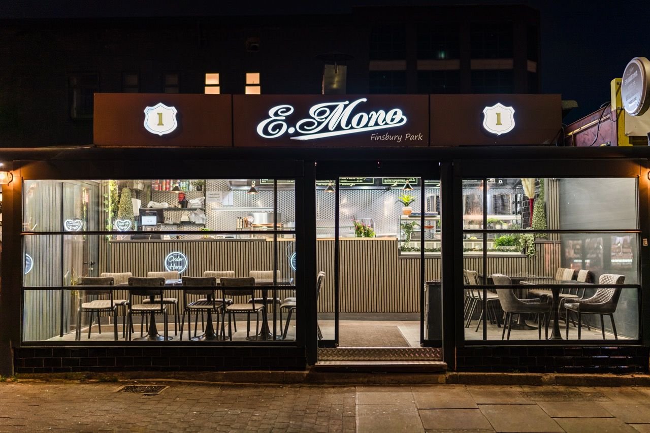 The E Mono shopfront on Stroud Green Road at night